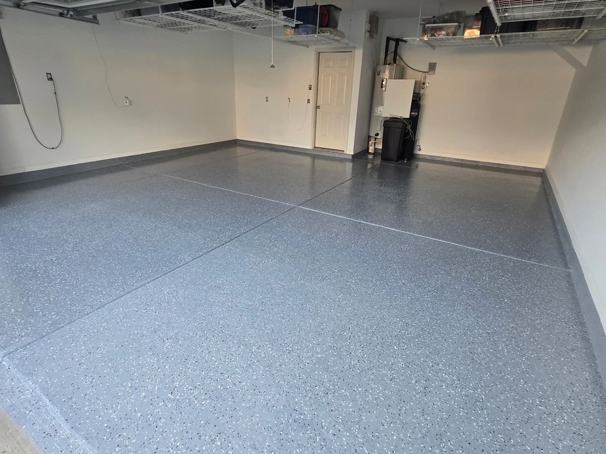 Close-up overhead view of decorative vinyl flake chips in epoxy floor coating